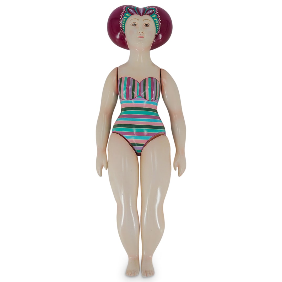 Sergio Bustamante (Mexican, B. 1949) Resin Adjustable Female Swimmer: DESCRIPTION: Resin figurine by Sergio Bustamante depicting a female swimmer featuring adjustable limbs. Signed on left hip and numbered 4 of 100. CIRCA: 20th Century ORIGIN: Mexico DIMENSIONS: H: 23.7