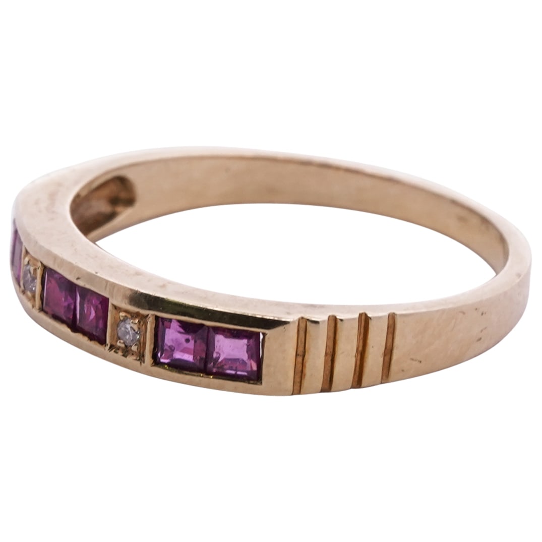 14k Gold, Diamond and Amethyst Ring: DESCRIPTION: A 14k gold ring inset along the setting with square cut amethysts and diamond accents. Stamped "14k". Total Weight: 2.3 Grams (1.5 dwt) CIRCA: 20th Cent. ORIGIN: USA DIMENSIONS: Ring Size