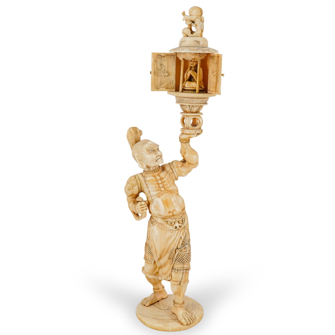 19th C. Japanese Meiji Period Carved Bone Okimono: DESCRIPTION: 19th C. Japanese Meiji period carved bone Okimono with intricate anatomical details, fierce expression and beast decorated robe. Completed supporting a hinged door cabinet shrine with sea