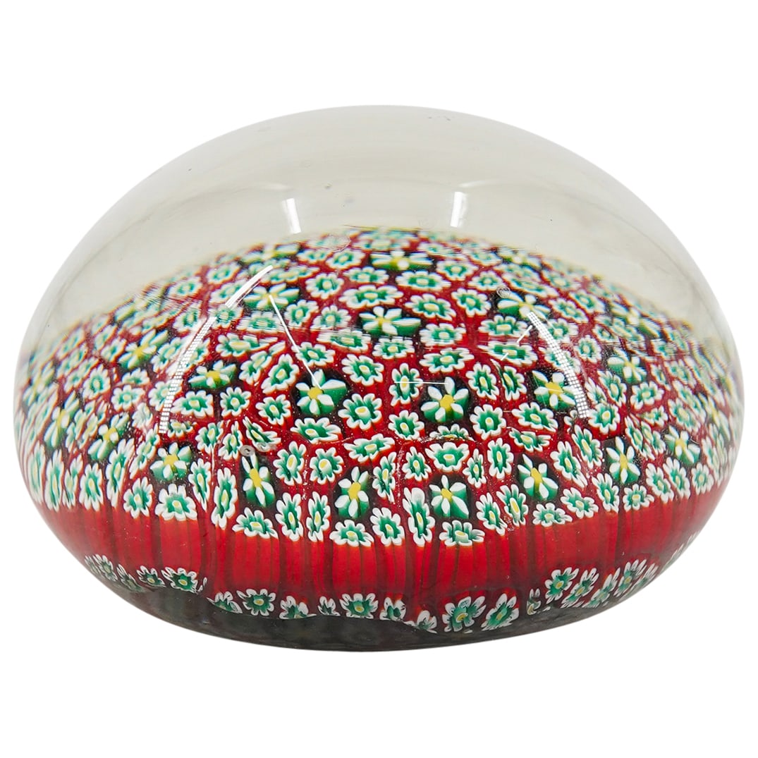 Magnum Close Millefiori Glass Paperweight: DESCRIPTION: Magnum glass paperweight featuring close millefiori. Unmarked. CIRCA: 20th century, possibly later ORIGIN: - DIMENSIONS: H: 2.5" Diameter: 3.75" CONDITION: A scratch at top. A few other, 
