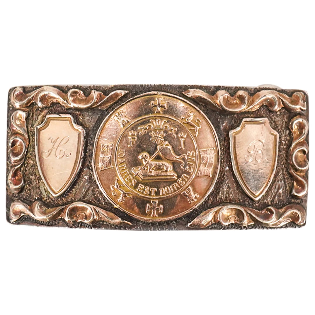 Sterling Silver Gold Vermeil Buckle: DESCRIPTION: Mexican Sterling Silver and Gold Vermeil Buckle. with central motif depicting the Puerto Rico Latin motto, "JOANNES EST NOMEN EJUS" (a quotation from the Vulgate of Luke 1:63), means "Joh