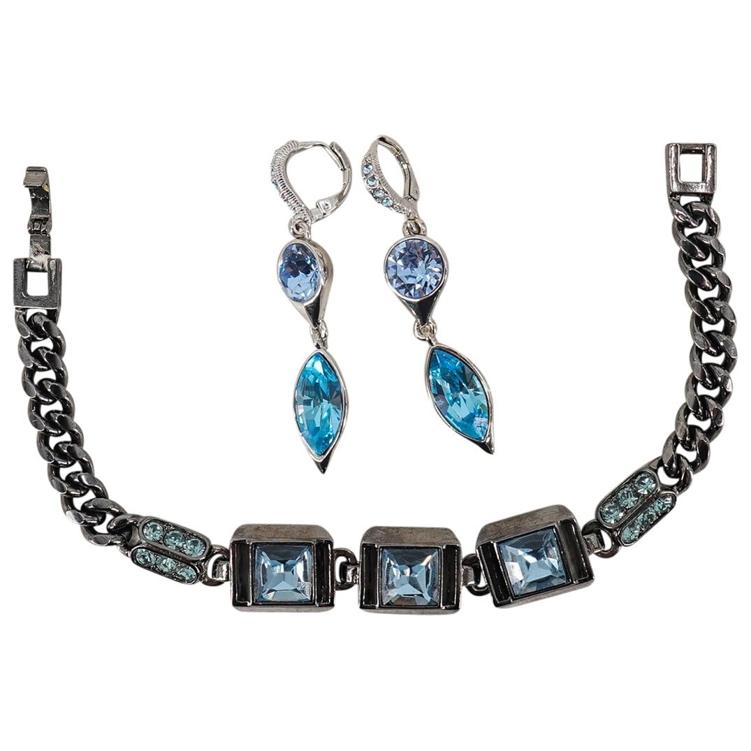 (2 Pc) Designer Givenchy Costume Jewelry Bracelet & Earrings Set: DESCRIPTION: (2 Pc) Designer Vintage Givenchy Costume Jewelry Bracelet & Earrings Set. Includes one (1) bracelet with three square faux aquamarine hued crystals; and one (1) pair of earrings with aqua