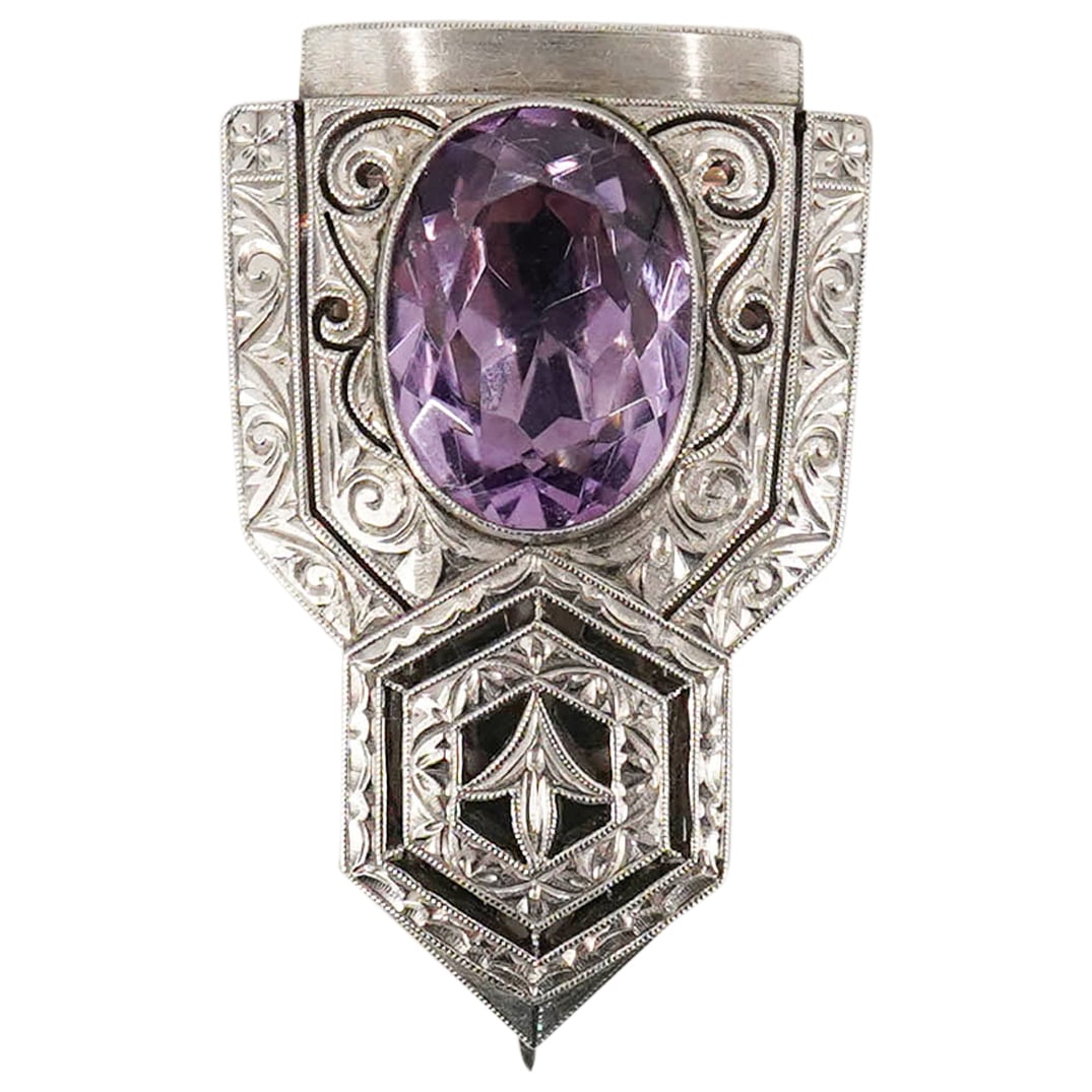 Platinum And Amethyst J. Schnelwar & Sons Clip Brooch: CIRCA: 20th Century