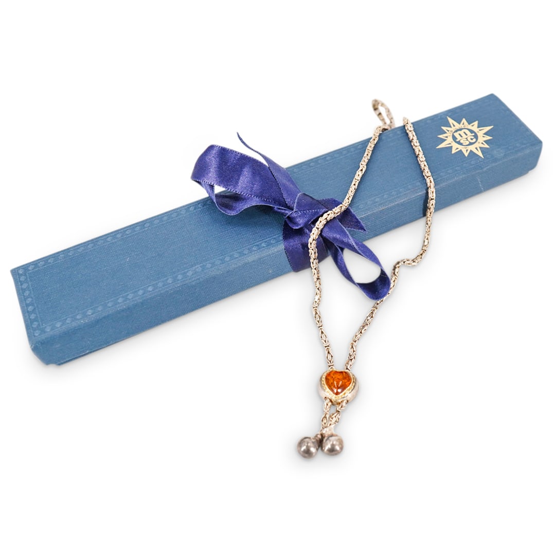 Vintage Sterling Silver & Amber Necklace: DESCRIPTION: Vintage Sterling Silver and Amber Necklace, with a heart shaped detailing. Marked 925. Total weight: 22 grs. CIRCA: 20th Century ORIGIN: DIMENSIONS: L : 8 1/2". Total weight: 22 grs. COND