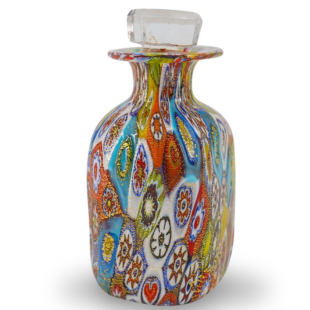 Vintage Murano Glass Millefiori Perfume Bottle: DESCRIPTION: Vintage Murano glass perfume bottle composed entirely of millefiori segments accented with gold flake and crowned with a clear glass stopper. CIRCA: 1930s to 1960s ORIGIN: Italy DIMENSION
