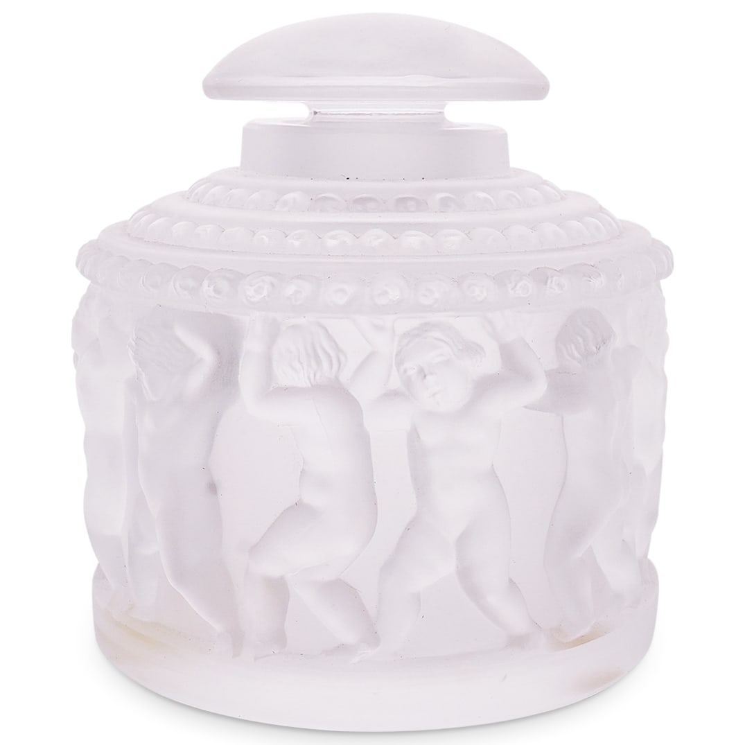 Lalique Crystal "Les Enfants" Bottle: DESCRIPTION: Lalique Crystal "Les Enfants" Bottle. "Les enfants" was a 1931 design of Rene Lalique. The design features a continuous freeze of naked children dancing round the body of the bottle, thei