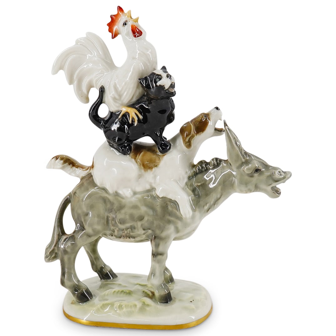 Lorenz Hutschenreuther Porcelain "Bremen Town of Musicians" Figurine: DESCRIPTION: A German Lorenz Hutschenreuther Kunstabteilung "Bremen Town of Musicians" porcelain figurine depicting a rooster, a cat, and a dog, atop a donkey. Based on the Brothers Grimm's The "Town