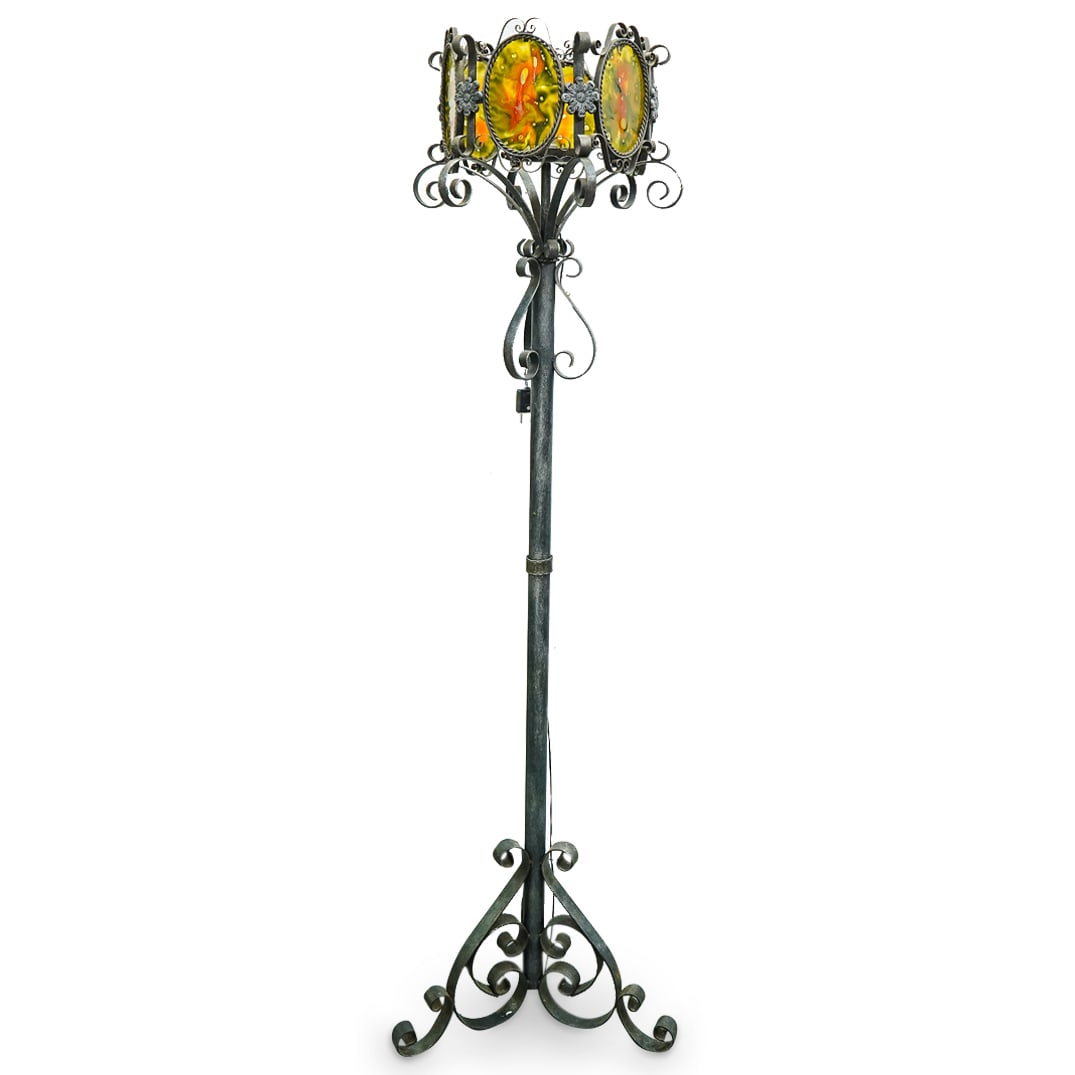 Vintage Spanish Wrought Iron Floor Lamp: DESCRIPTION: Vintage wrought iron tripod floor lamp featuring scroll form trimmings and adornments throughout and sporting six stained glass shades around light fixture. Untested, see condition. CIRCA