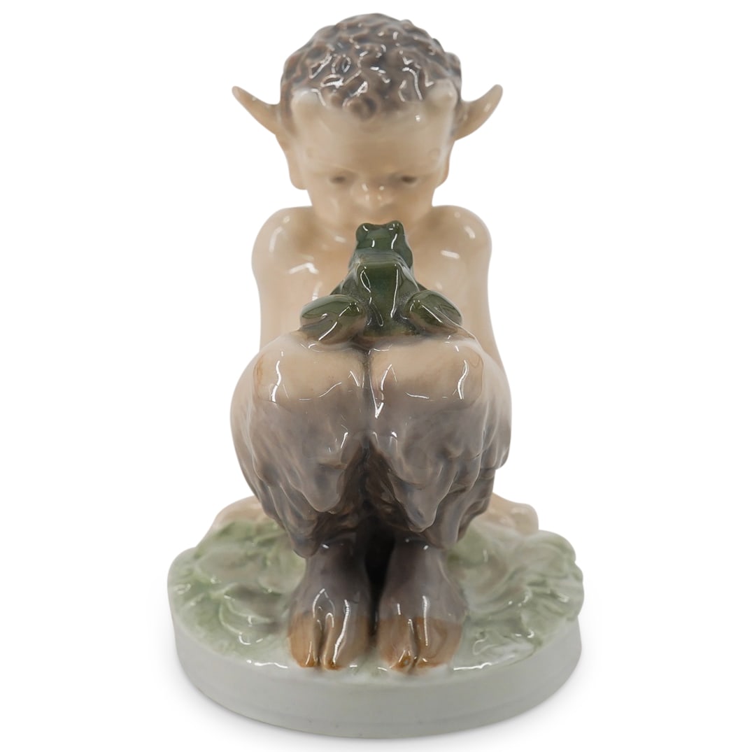 1949 Royal Copenhagen Faun With Frog: DESCRIPTION: Vintage Royal Copenhagen porcelain figurine depicting a faun on hands and hooves supporting a frog on his knees. Traditionally hallmarked on underside with date mark above second "N" in "