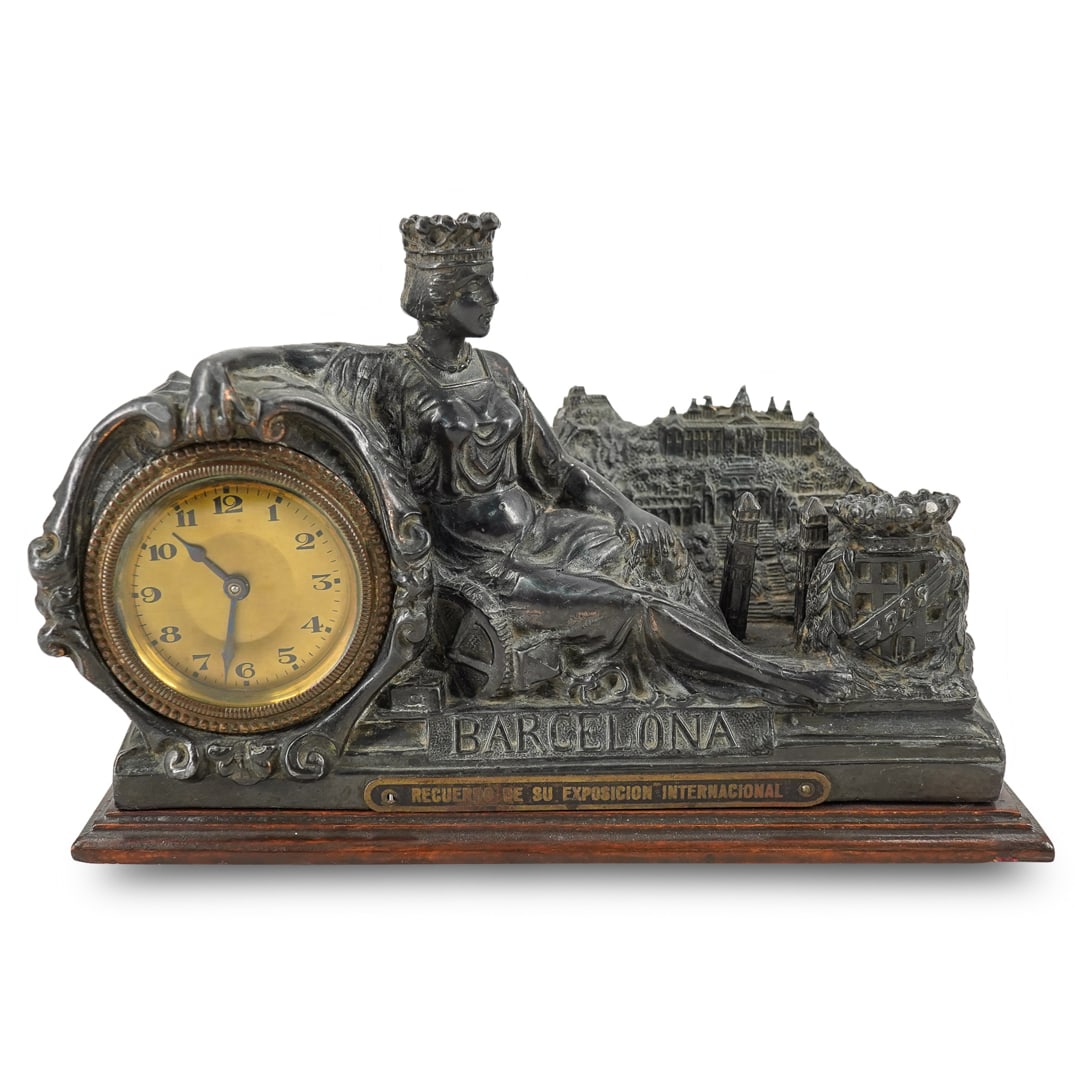 1929 Spanish Antique Bronze Barcelona Memento Mantle Clock: DESCRIPTION: 1929 Spanish Antique Bronze Barcelona Memento Mantle Clock. From the International Barcelona Exposition in 1929. Depicts Queen María Cristina, the Palace, and Montjuic. With inscription