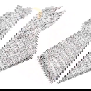Art Deco Platinum and 15ct Diamond Earrings: DESCRIPTION: A pair of Art Deco Platinum earrings featuring in a fan form, heavily garnished with .05 to .10 round cut diamonds along the center frame. Further finished with baguette diamonds along