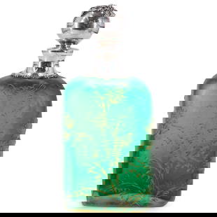 Ex Christie's Art Nouveau Daum Nancy Pate De Verre And Sterling Silver Perfume Bottle: DESCRIPTION: Art Nouveau Daum pate-de-verre glass perfume bottle featuring a raised, gilt accented thistle design and sporting a sterling silver collar and sterling coated stopper. Christie's tag