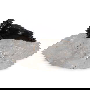 Faberge Obsidian & Rock Crystal Model of Seal: DESCRIPTION: Faberge obsidian carved model of a seal reclined atop a natural rock crystal ice floe. Seals eyes set with rose cut diamonds. Label at underside: 'Heller' CIRCA: 1900s ORIGIN: Russia