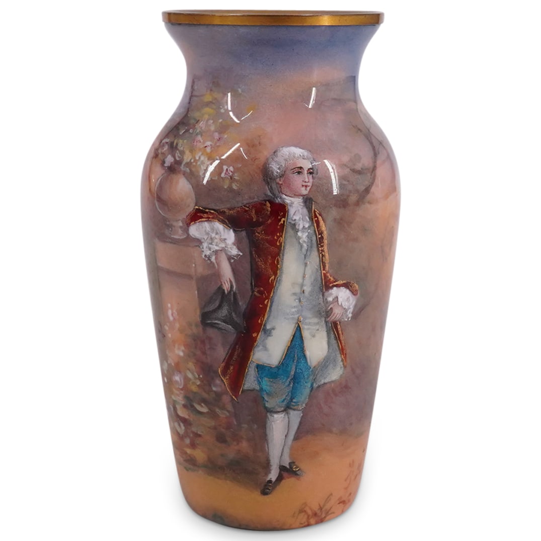 Antique Limoges Enameled Youth In Garden Vase: DESCRIPTION: Antique Limoges enameled gilt copper vase depicting on its side a scene of a youth in a garden. CIRCA: 1890s-1910s ORIGIN: France DIMENSIONS: H: 4" D: 2" CONDITION: Minor tarnishing consi