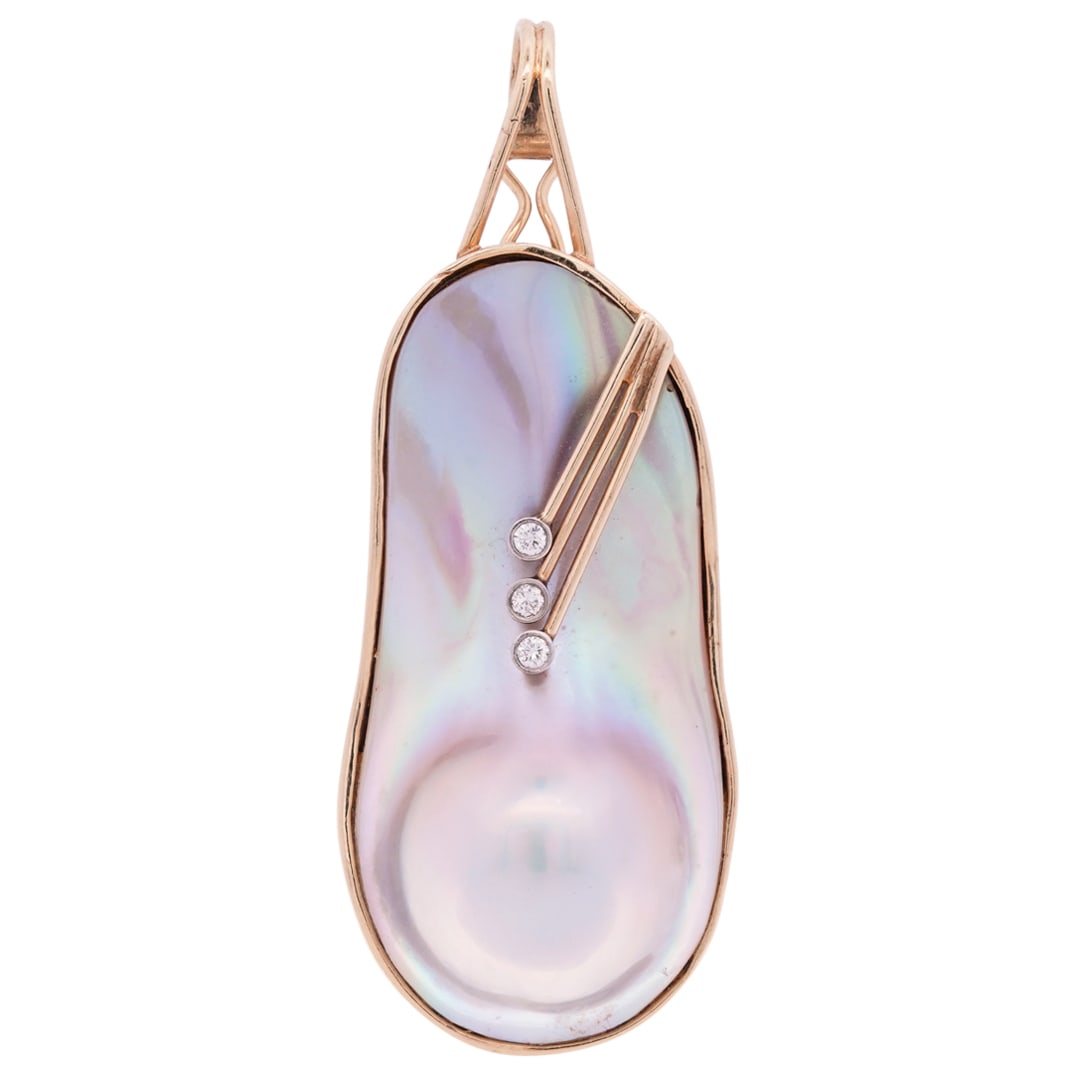 Modernist 14k Gold, Baroque Pearl and Diamond Pendant: DESCRIPTION: A Modernist pendant feature a 14k yellow gold frame an bale, centered by a large baroque pearl with overlay decorations and diamond accents. Stamped "G14k". Total Weight: 20 Grams (12.87 