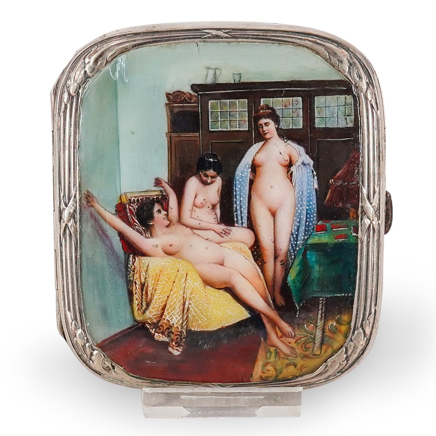 Art Nouveau Alpacca Hoka Metal Enameled Three Nudes Cigarette Case: DESCRIPTION: Art Nouveau cigarette case crafted from Alpacca Hoka "silver" and featuring a scene on the lid of three nude women in a room. Marked "Alpacca Hoka" on clasp. CIRCA: 1890s-1910s ORIGIN: Ge