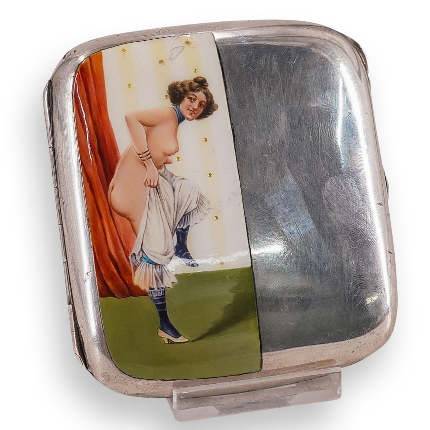 Art Nouveau Erotic Silver & Enamel Cigarette Hinged Case: DESCRIPTION: Art Nouveau erotic silver cigarette hinged case with enamel painted decorated lid, depicting an erotic scene with a young standing maiden figure, undressing while wearing her undergarment