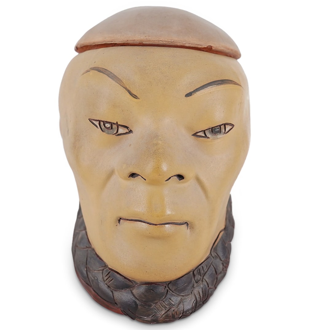 Dickens Weller Pottery Orientalist China Man Bust Humidor: DESCRIPTION: Dickens Weller Pottery ceramic humidor crafted as a chinaman's head and collar, the scalp of which forms a removable lid. Marked "DICKENS WELLER" on underside of lid. CIRCA: 1900-1905 ORI