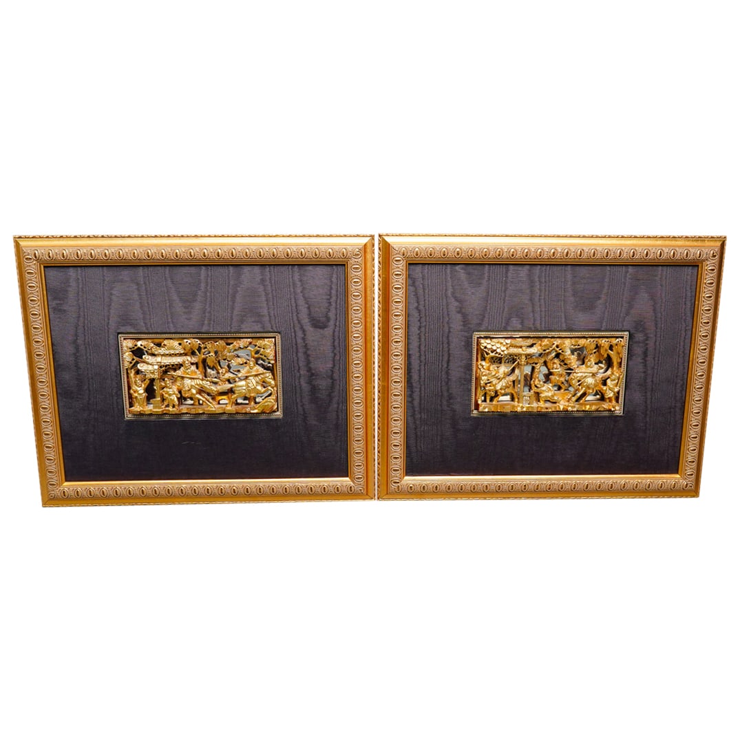 Pair Chinese Carved & Gilt Wood Plaques: DESCRIPTION: Pair of Chinese carved & gilt wooden openwork relief plaques depicting warriors and other figures amid trees. Each plaque framed and backed by a mirror. CIRCA: 1940s-1950s ORIGIN: Chinese