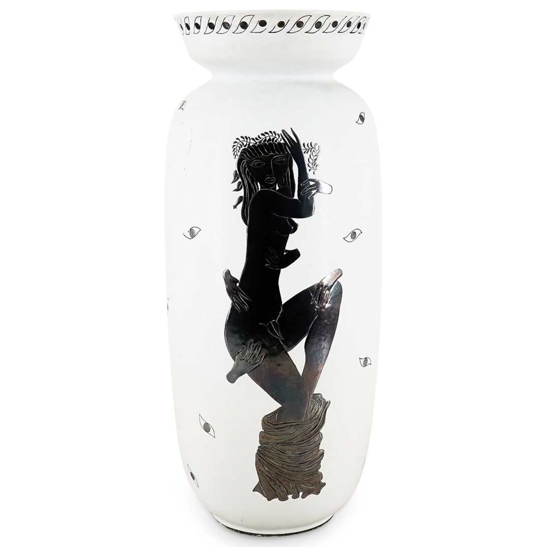 Art Deco Gustavsberg Silver Overlay "Grazia" Ceramic Vase: DESCRIPTION: Art Deco Gustavsberg ceramic vase featuring silver overlay depicting several eyes surrounding a nude woman pet by disembodied hands. Signed and marked "Made in Sweden" on underside. Prove