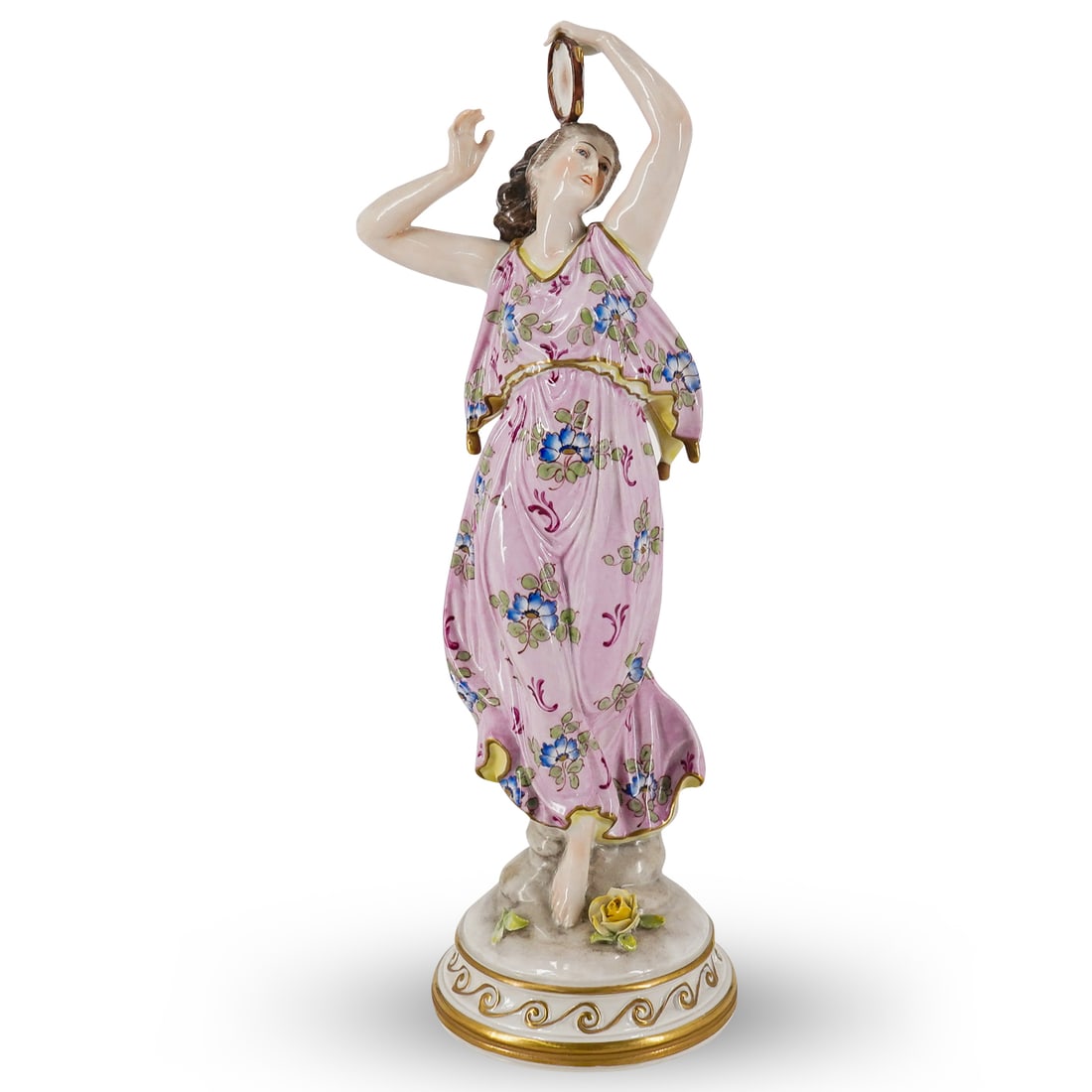 Italian Capodimonte Porcelain Figurine: DESCRIPTION: Italian Capodimonte porcelain figurine depicting a classical female dancer with raised arms, playing the tambourine. With polychrome painted motifs, gilt accents, and glazed finish. Marke