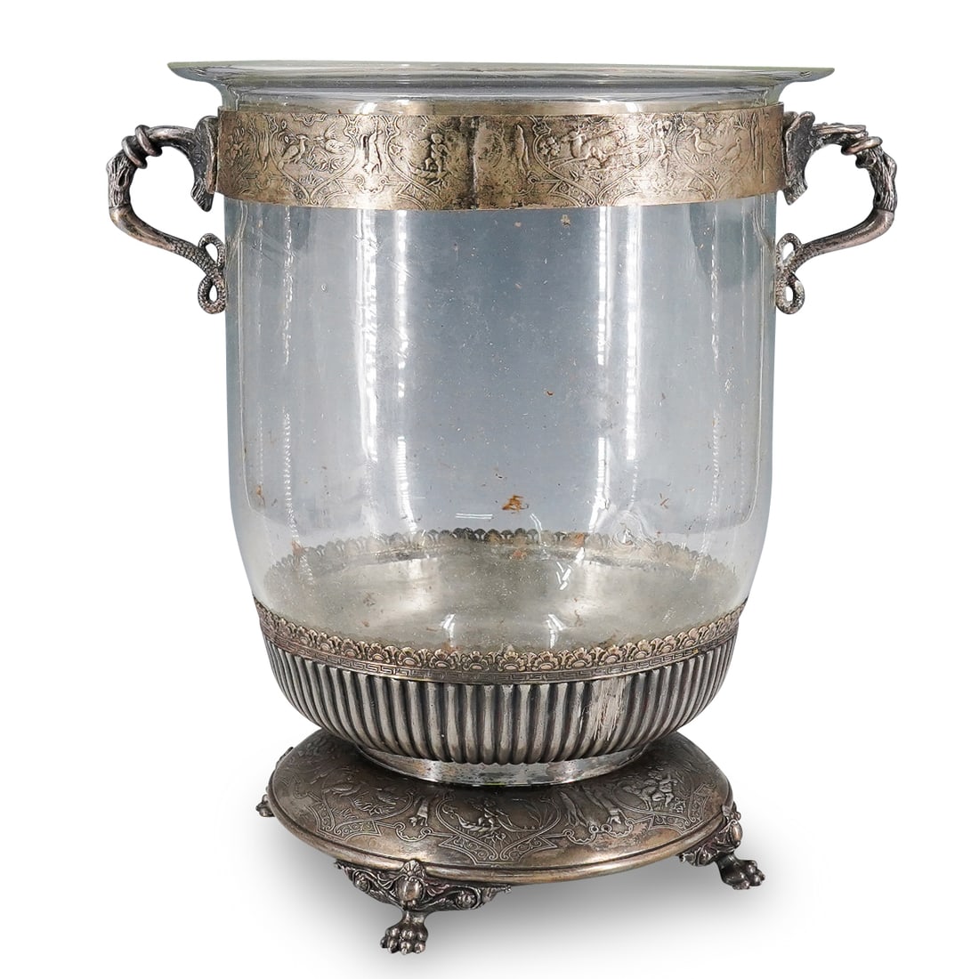 Antique French Glass And Mixed Metal Etched Centerpiece Vase: DESCRIPTION: Antique centerpiece vase composed of a glass vase proper set onto a mixed metal base and ringed with a collar and lily pad and foliage form handles. Collar and base each feature scenes of