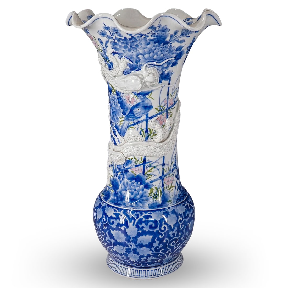 Antique Japanese Arita Blue And White Porcelain Raised Dragon Vase: DESCRIPTION: Antique Arita porcelain vase coated in a blue and white glaze throughout featuring green and pink floral motifs in the background of a garden scene populated by songbirds. Prominent textu