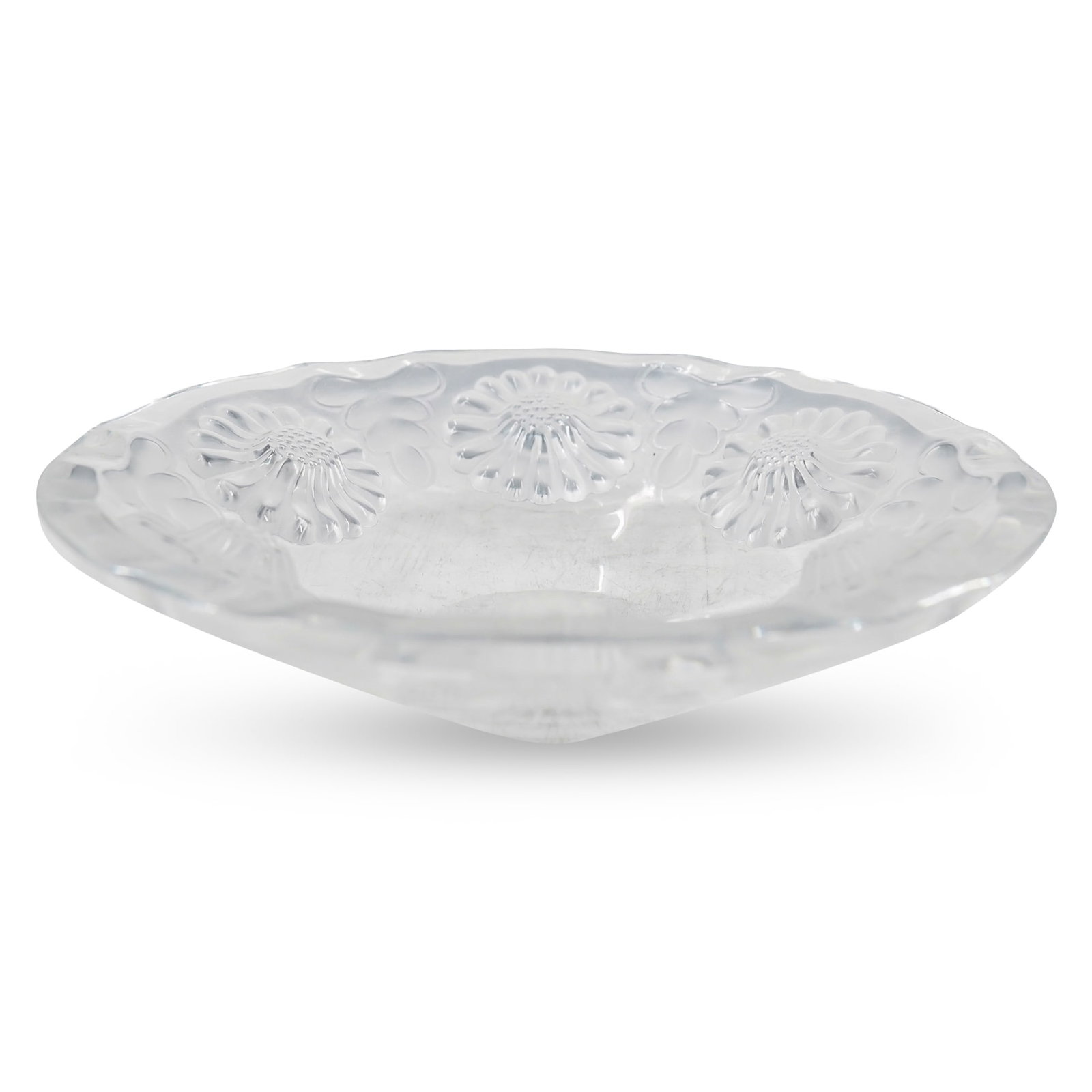Lalique Crystal "Paquerette" Bowl: DESCRIPTION: A Lalique crystal "Paquerette" pattern bowl. Embellished with embossed daisies along the scalloped bowl, intersected by leafy designs. Marked on bottom:"Lalique R France". CIRCA: 20th Cen