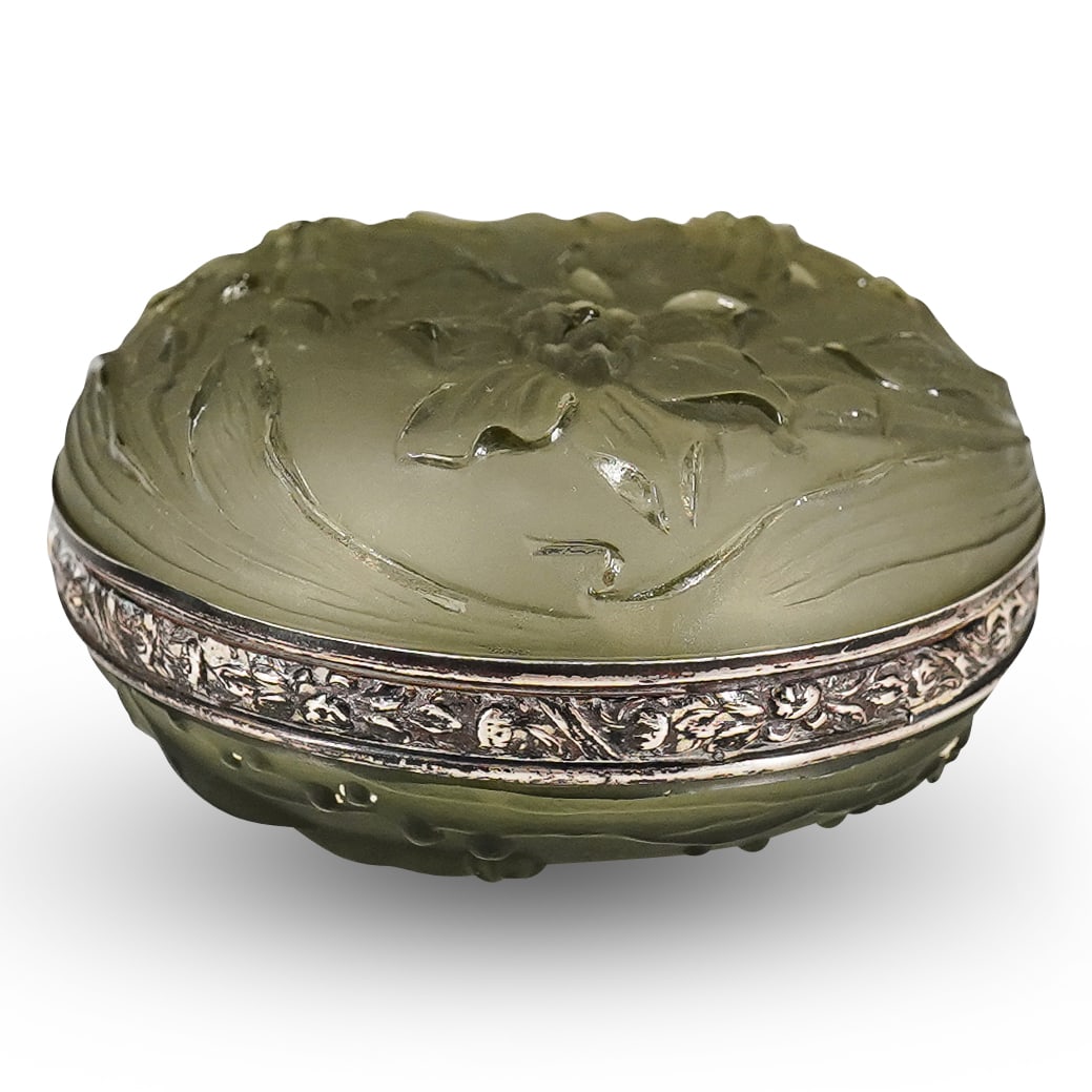 Art Deco French Cut Glass Powder Jar: DESCRIPTION: Early 20th century French cut glass powder jar with flowers cut in top lid, goldfish on the bottom, silver floral and filigree trim in the middle. CIRCA: Early 20th Cent. ORIGIN: France D