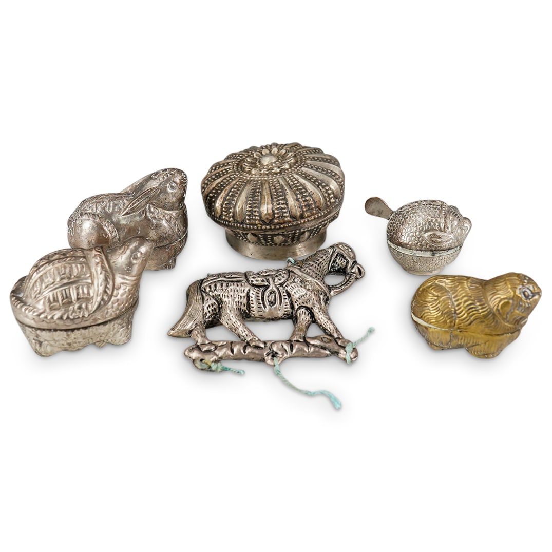 (6 Pc) Asian Figural Betel Nut Boxes & Talisman Pendant: DESCRIPTION: Set of 5 Asian figural betel nut boxes featuring a rabbit, puffer fish, turtle, small gerbil, and a round lidded box. All have silver finish with the exception of the small gerbil box whi
