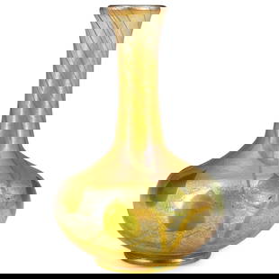 Antique Louis Comfort Tiffany Favrile Glass Bud Vase: DESCRIPTION: Antique favrile glass vase by Louis Comfort Tiffany featuring green foliage motifs against a yellow iridescent ground. Initialed "L.C.T." and marked "981 1091 G" on underside. CIRCA: