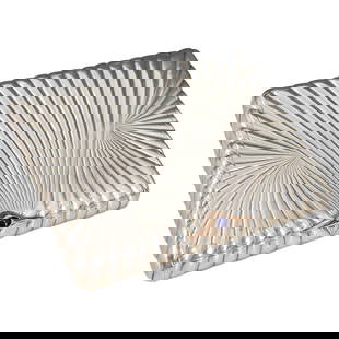Russian Gold Mounted Silver Cigarette Case (St. Petersburg): DESCRIPTION: Russian yellow gold mounted silver cigarette case with chevron designed exterior and sapphire inset gold thumb-piece, opens to reveal gold varnished interior. Markings: 84 (Standard)