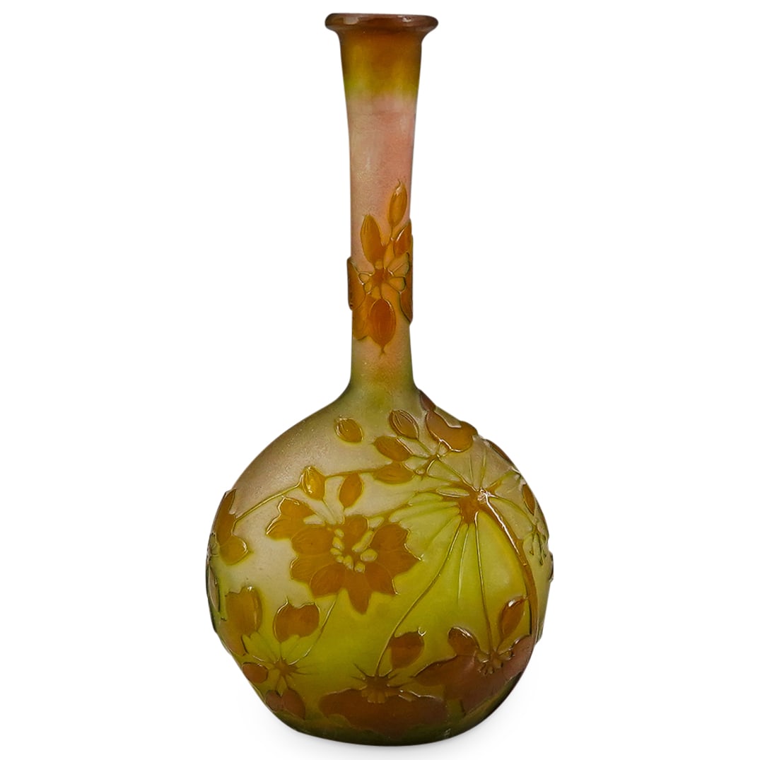 Emile Galle (French, 1846-1904) Cameo Glass Fluted Necked Vase: DESCRIPTION: Antique cameo glass vase by Emile Galle crafted in a bulbous form featuring a fluted neck and sporting raised floral and foliage designs around neck and body. CIRCA: 1870s-1904 ORIGIN: Fr