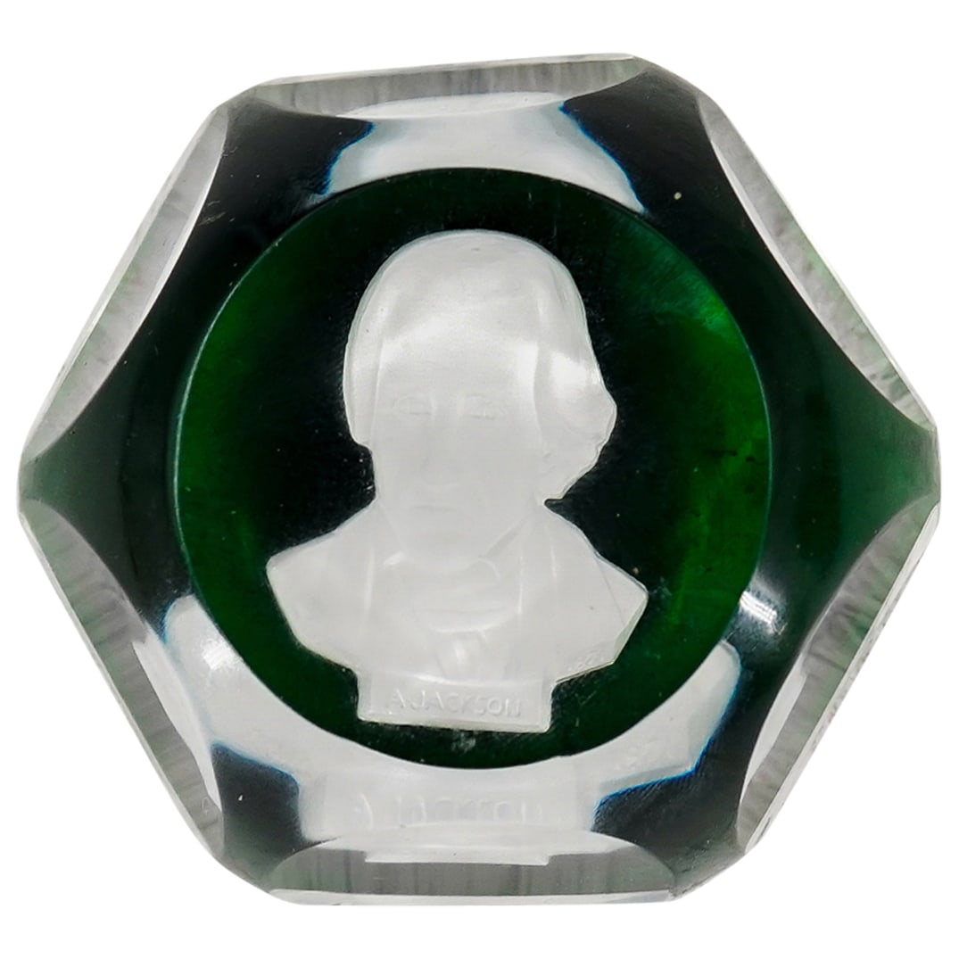 Baccarat Cameo Crystal Paperweight: DESCRIPTION: Baccarat cameo crystal paperweight featuring a clear crystal body and emerald green base, with a white cameo of 'Andrew Jackson', who served as the seventh President of the United States