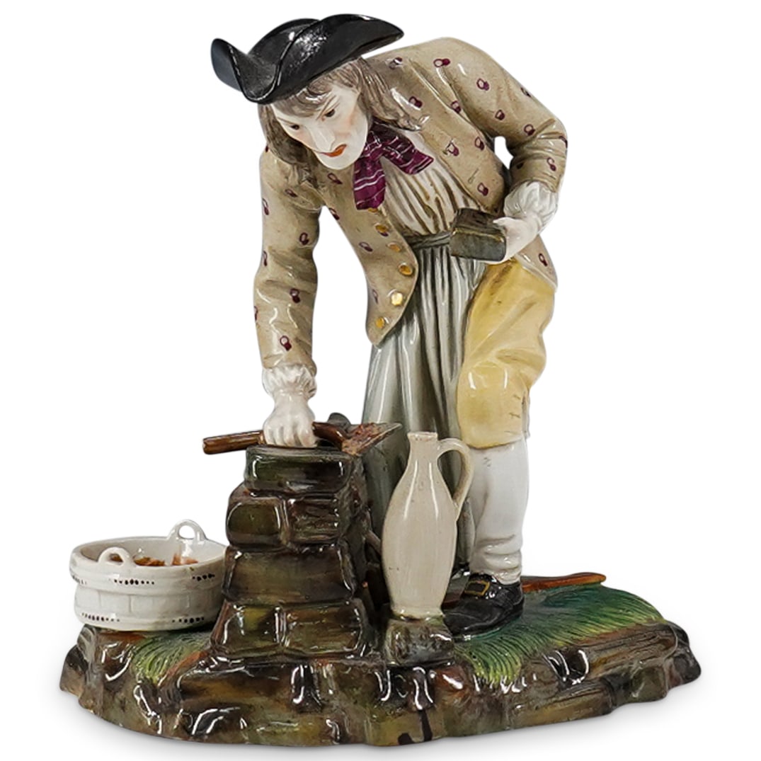 Antique 18th Cent. Hoechst Porcelain Figurine: DESCRIPTION: 18th Century Hoechst Porcelain Gentleman Figurine. Depict an artisan male figure with polychrome hand painted glazed finish. Marked with the blue Hoechst six-spoke wheel hallmark (ca. 174