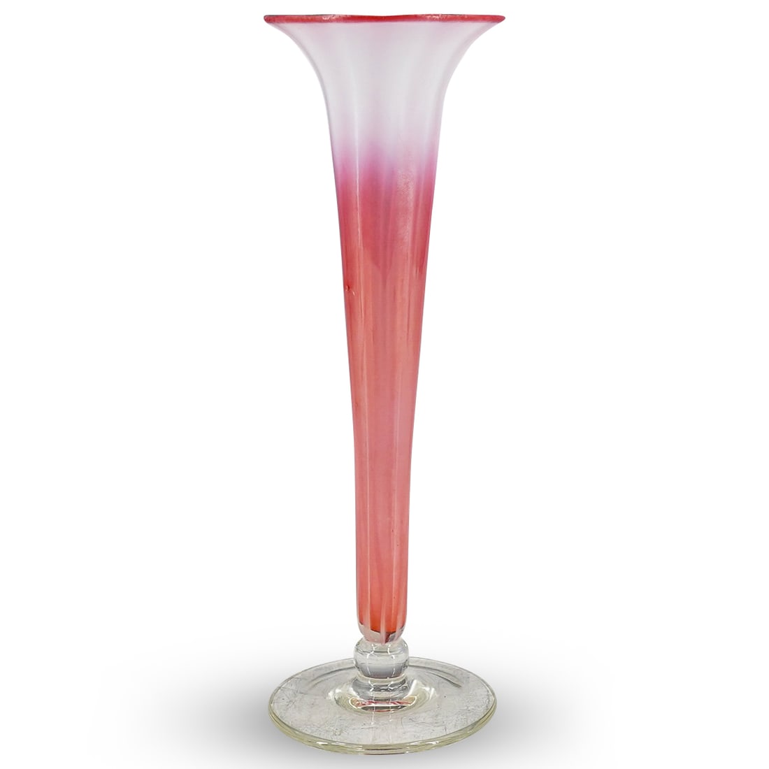 Tiffany Pastel Glass Trumpet Vase: DESCRIPTION: Tiffany pastel glass trumpet vase, in colorless glass, pink colored glass, and opalescent glass, the body partially faceted and ribbed, the rim slightly undulating. Marked on underside wi