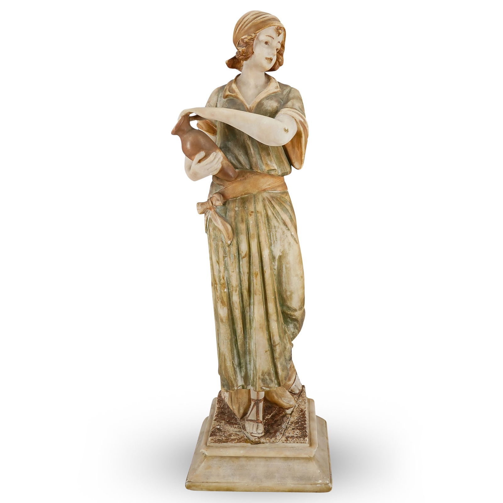 Art Nouveau Alabaster Woman Sculpture: DESCRIPTION: Art nouveau alabaster sculpture depicting a woman with a scarf around her head, wearing a long dress and sandals, holding a vase in her hands. Standing atop alabaster stepped base. CIRCA: