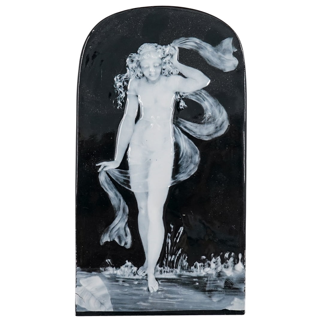 George Jones & Sons Pate Sur Pate Nude Plaque: DESCRIPTION: George Jones & Sons pate sur pate plaque, featuring black ground and white relief image of nude woman dipping her toe in the water. Impressed mark on reverse "G. Jones & Sons" CIRCA: 19th