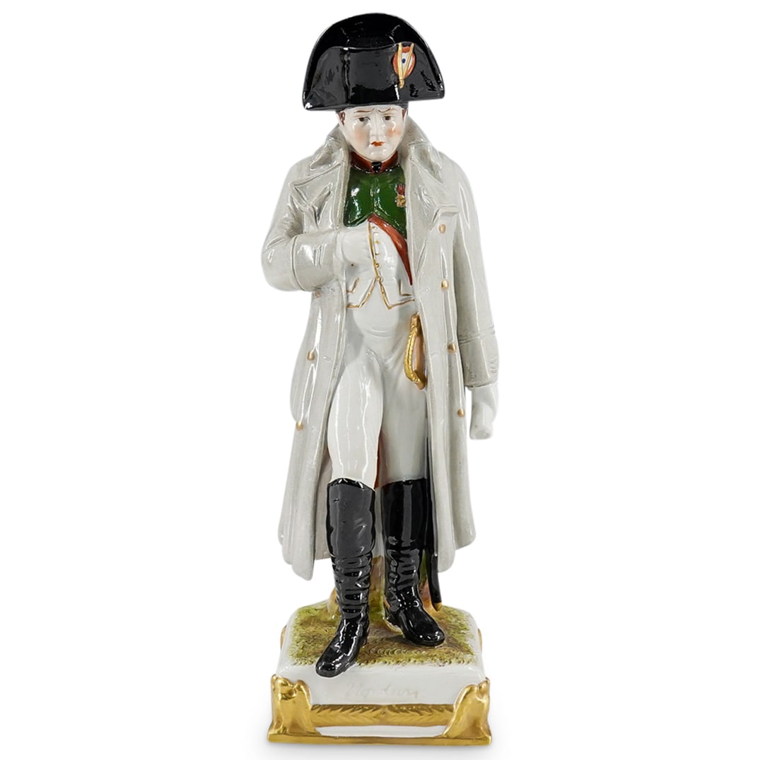Vintage Scheibe Alsbach Porcelain Napoleon Figurine: DESCRIPTION: Vintage Scheibe-Alsbach porcelain figurine depicting Napoleon Bonaparte posing and bearing a scroll in his left hand. Impressed on underside with various events in the emperor's life and 