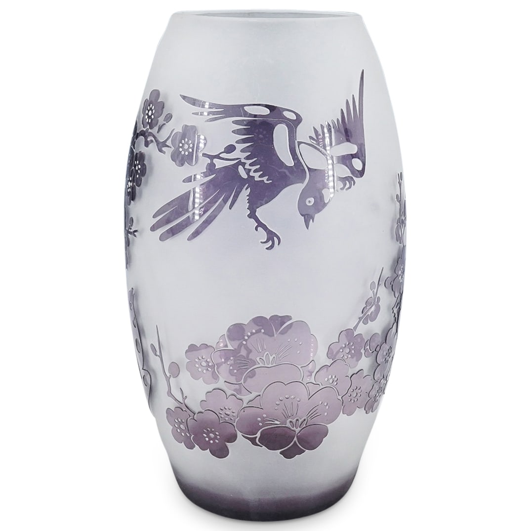 Ajka French Purple Cameo Glass Vase: DESCRIPTION: Ajka cameo glass purple vase featuring oriental style bird and flowering branch designs in relief. Marked with "E" on underside. CIRCA: 20th Century ORIGIN: Hungary DIMENSIONS: H: 10.5" D