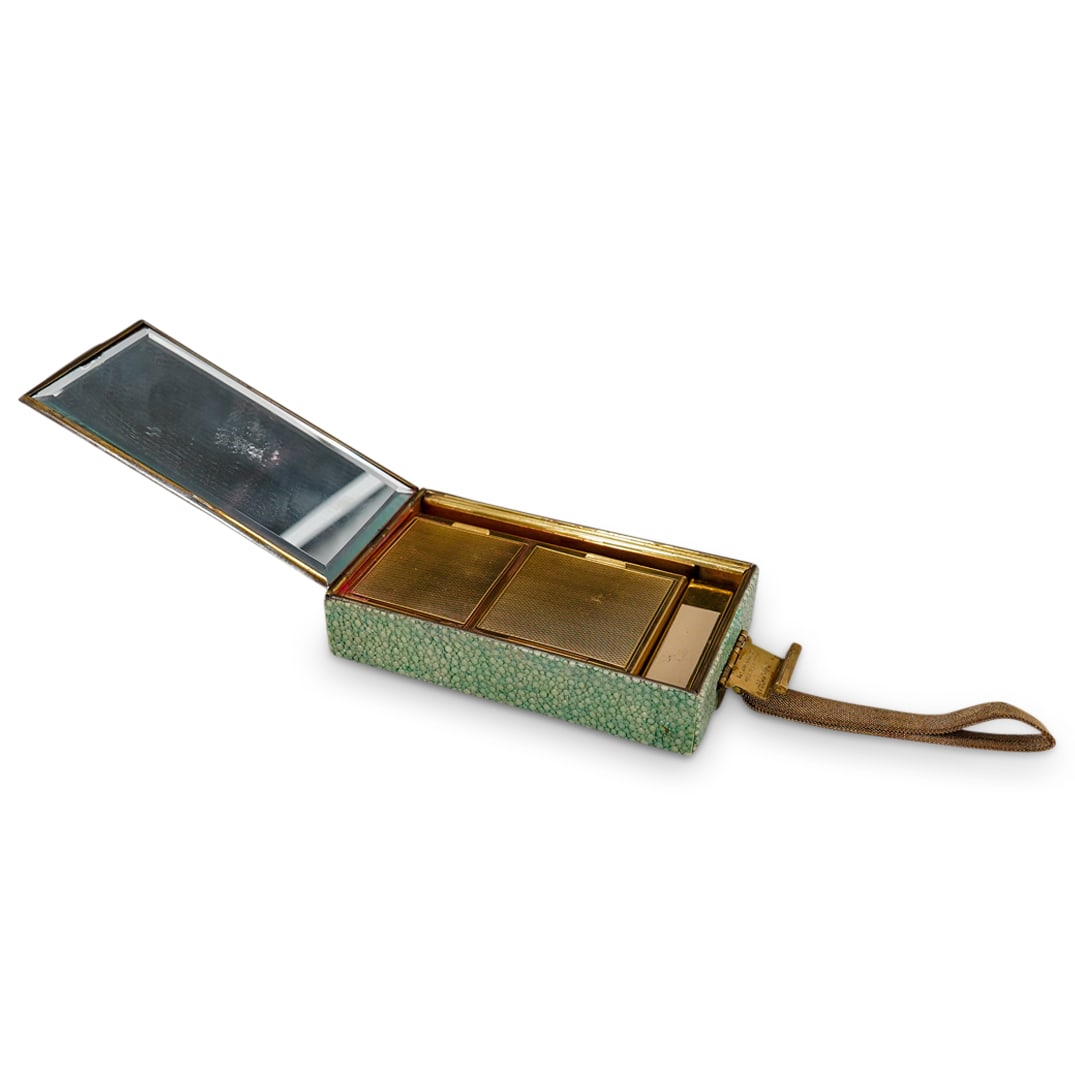 Antique French Shagreen Minaudiere: DESCRIPTION: Antique French shagreen minaudiere, with gold strap and clasp, marked "Pat App. 1858737 Regd. Des. 817716 DRGM18476" Inside is a rectangular beveled mirror on one side, a space for blush,