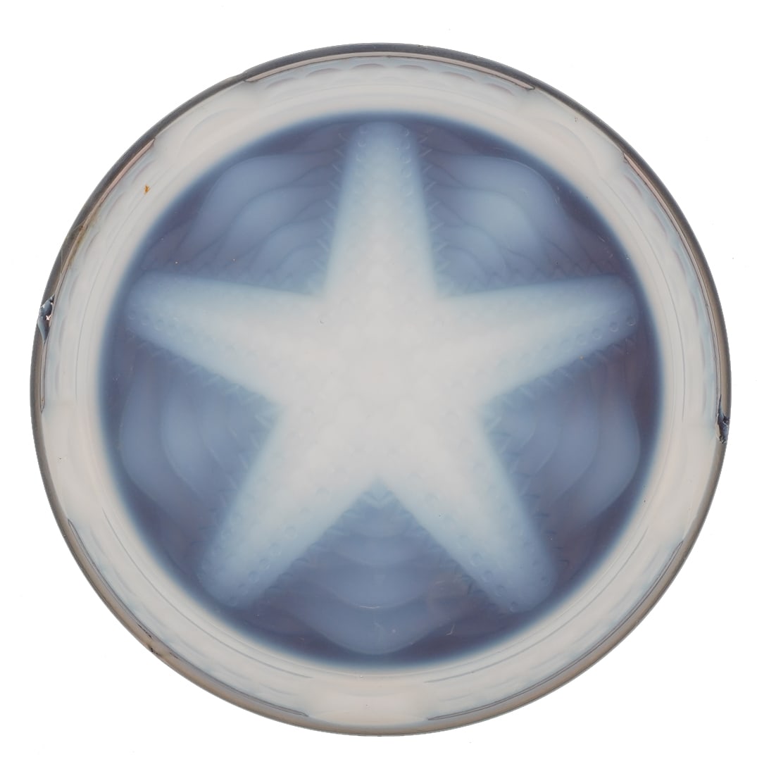 Art Deco Sabino Style Glass Trivet: DESCRIPTION: A Sabino style art glass trivet with center starfish design. CIRCA: 20th Cent. ORIGIN: Continental DIMENSIONS: H: 1" x D: 9" CONDITION: Chipping to underside, with scratching to top. Unle