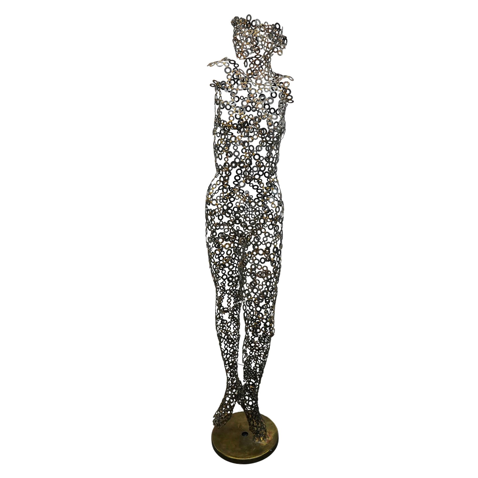 Style Of Niso Maman Iron Washer Nude Female Statue: DESCRIPTION: Sculpture composed of several iron washer rings soldered together in the form of a female figure and mounted on a gilt base. CIRCA: 20th Century ORIGIN: - DIMENSIONS: H: 69" W: 14.5" L: 1