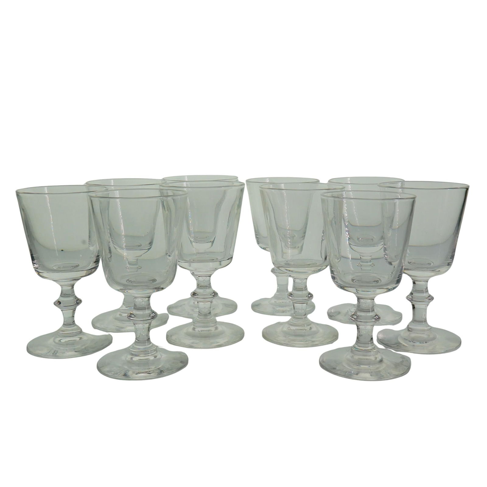 (10 Pc) Steuben Glass Wine Goblets Set: DESCRIPTION: (10 Pc) Steuben glass wine goblets set of ten (10) glasses, in the pattern 7725. Marked 'Steuben'. CIRCA: 20th Century ORIGIN: USA DIMENSIONS: Height: 4 3/4 in Width: 2 5/8 in CONDITION: