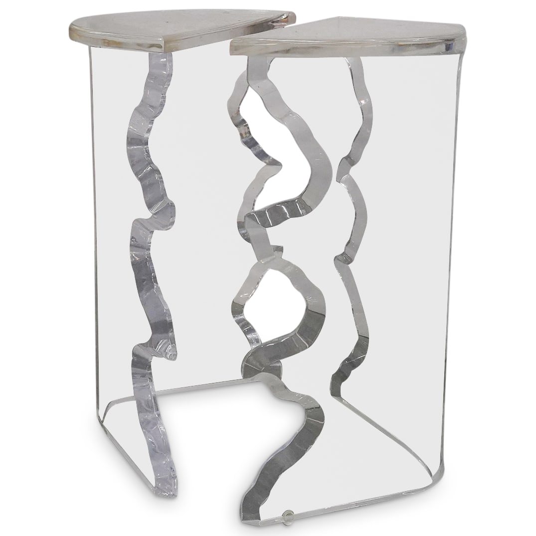 Pair Acrylic Side Tables: DESCRIPTION: Pair of acrylic side tables, each comprised of a removable hemispherical top and a base featuring two undulating sides. CIRCA: Late 20th century ORIGIN: - DIMENSIONS: H: 20.75" L: 16" Dep
