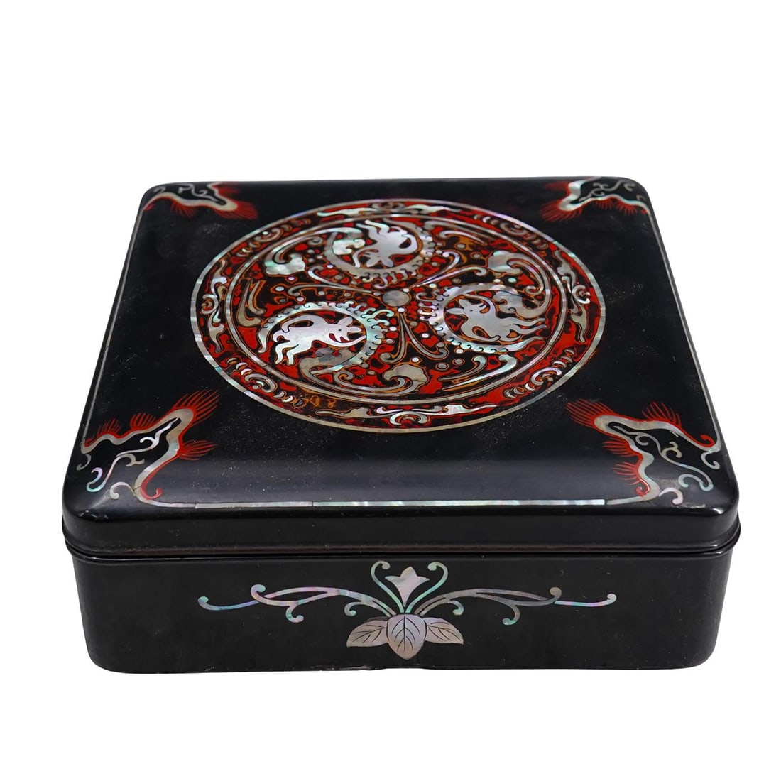 Japanese Lacquered Box W/ MOP Inlaid Motifs: DESCRIPTION: Japanese lacquered box in square form, with matching, decorated with Mother-Of-Pearl inlaid decorative motifs, and red painted accents. CIRCA: 20th Century ORIGIN: Japan DIMENSIONS: H: 2 