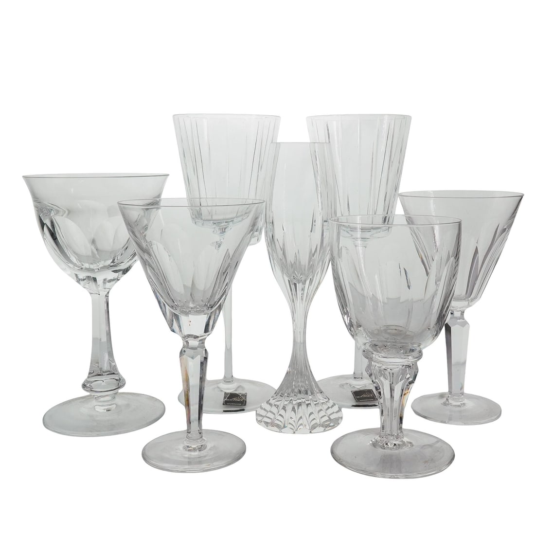 (7 Pc) Baccarat, Moser, Waterford & Rogaska Crystal Stemware: DESCRIPTION: 7 pieces of clear, colorless crystal stemware. (1) Baccarat "Massena" pattern champagne flute. Marked on underside. (H: 8.5" D: 2.75"). (1) Moser goblet in the "Lady Hamilton" pattern. Ma