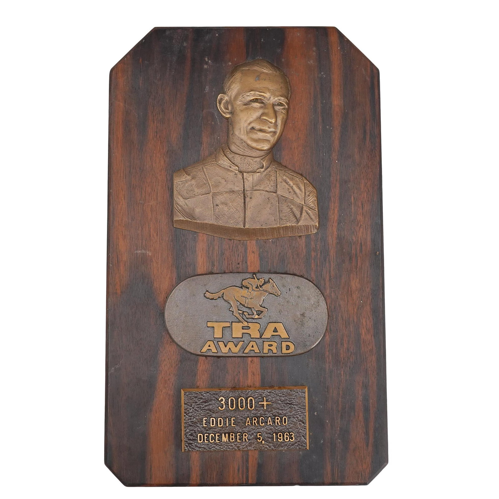 Equestrian TRA Award Eddie Arcaro 1963: DESCRIPTION: Equestrian TRA Award Eddie Acaro 1963 Horse jockey award. Sticker at verso: Jules R. Schubot, Detroit Mich. CIRCA: 1963 ORIGIN: Detroit DIMENSIONS: H: 15" x L: 9" CONDITION: Great conditi