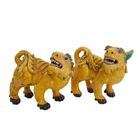 Pair Of Chinese Export Sancai Ceramic Buddhist Lions
