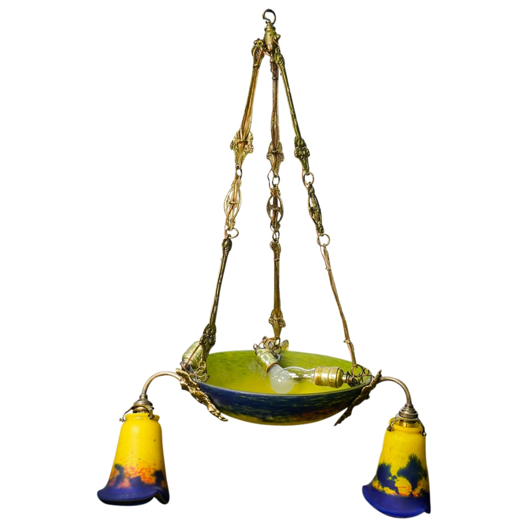 Jean Noverdy Art Nouveau Pate de Verre Chandelier: DESCRIPTION: Jean Noverdy art nouveau pate de verre chandelier, featuring grape motifs on the gilt hardware, one main large shade with mainly bright yellow ground and three separate shades. CIRCA: Ear